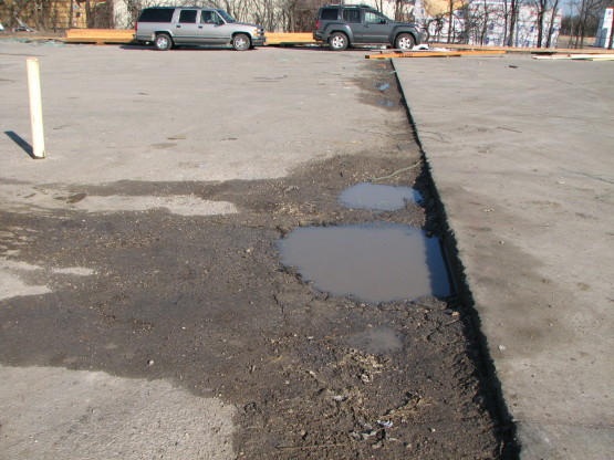 Slab-on-Grade and Pavement Distress Investigation and Remediation